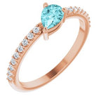 https://meteor.stullercloud.com/das/73382662?obj=stones/diamonds/g_accent&obj=metals&obj=stones/faceted/g_center&obj.colorRef=82&obj.curves=0,0.38,38.159,208.255,255&obj.curves.r=0,0.85,76.178,194.255,255&obj.curves.g=0,0.40,45.110,175.181,235.255,255&obj.curves.b=0,0.40,48.110,188.150,243.255,255&obj=metals&obj.recipe=rose&$standard$